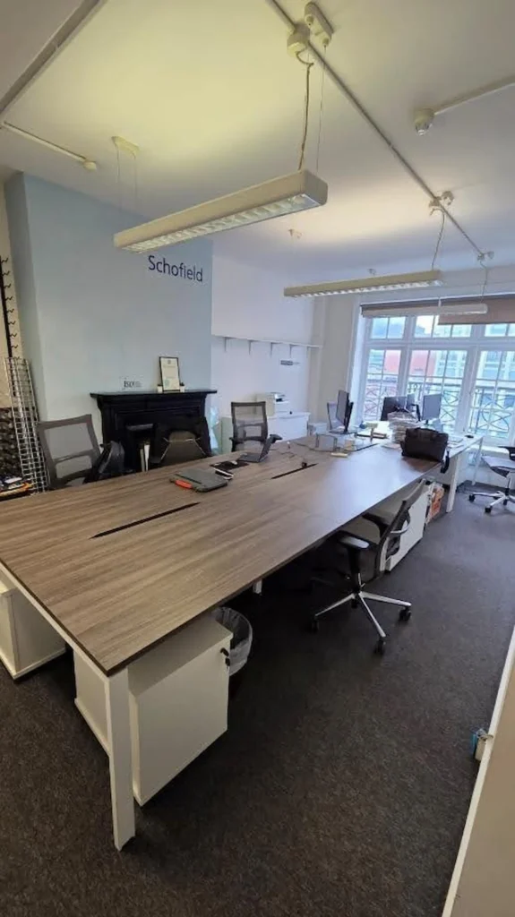 GC Reports London office workspace: A professional desk setup for our expanded team providing building compliance solutions in London