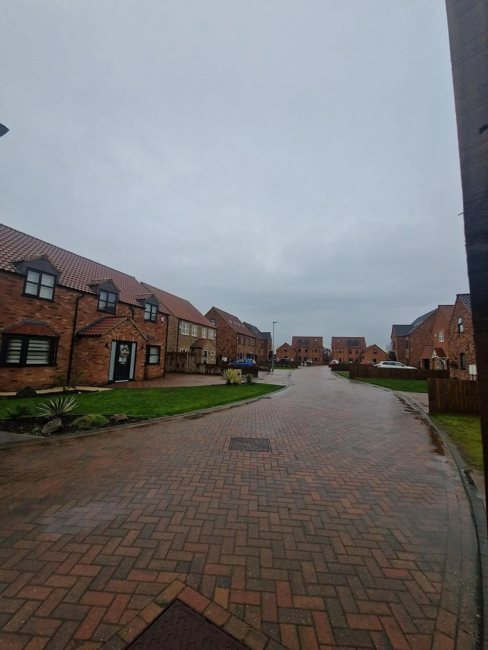 Modern energy-efficient housing development at the start of 2026, representing GC Reports' commitment to SAP compliance in the new year